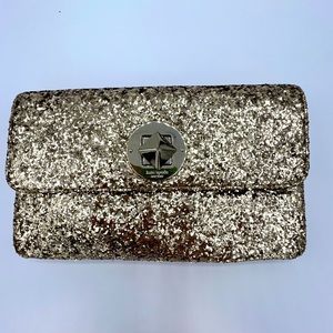 Gold glitter Kate Spade clutch